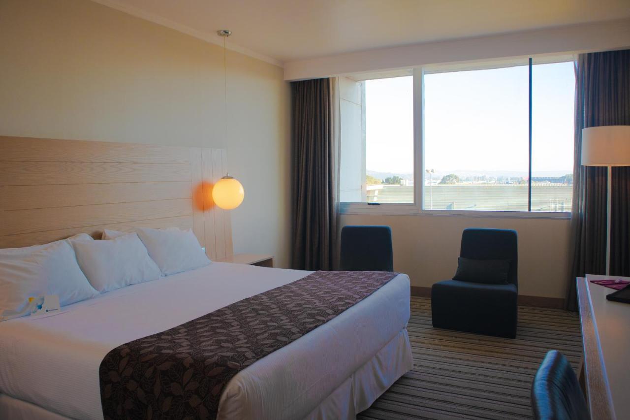 Wyndham Concepcion Pettra Hotel Exterior photo A room at the hotel