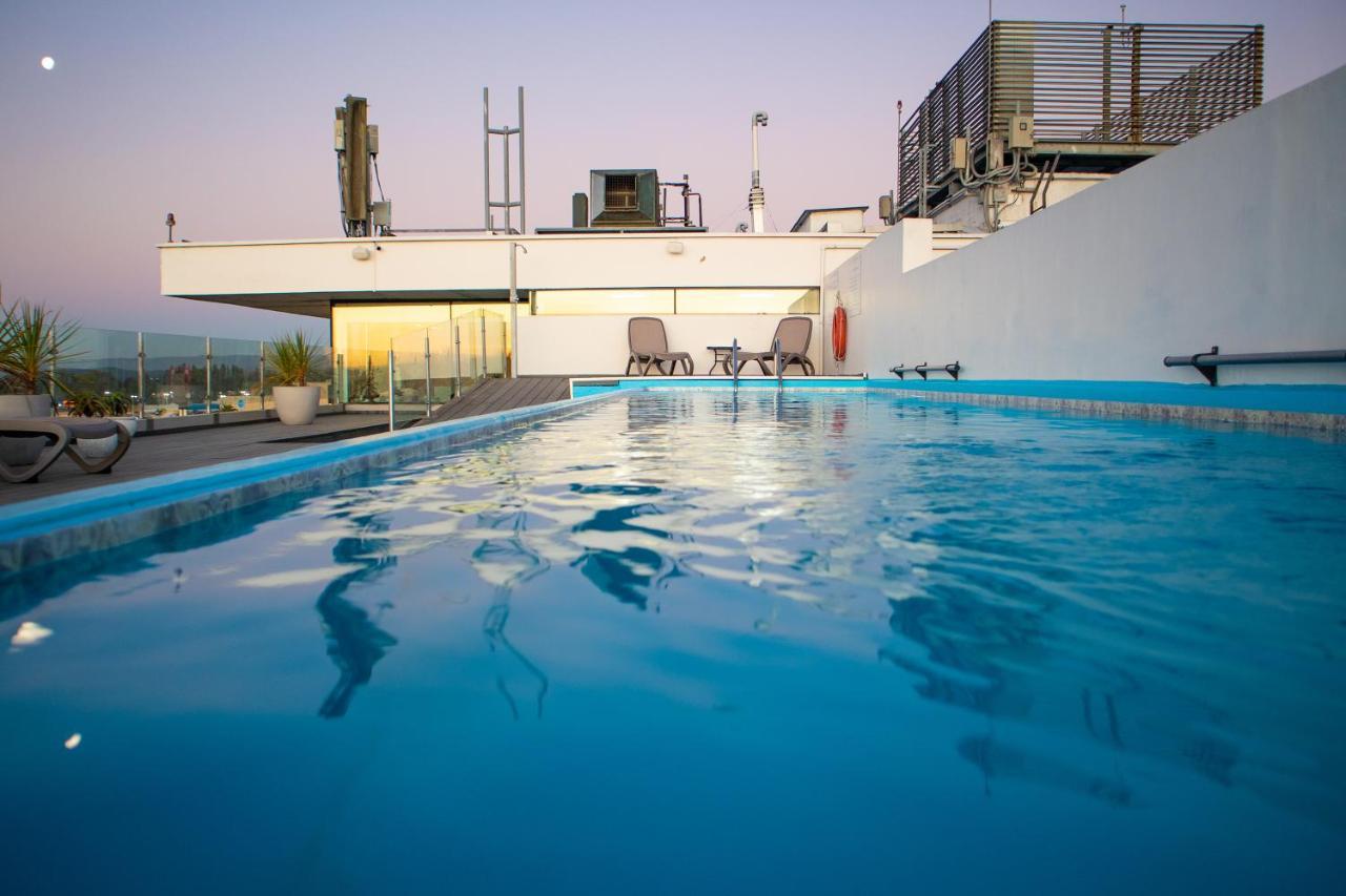 Wyndham Concepcion Pettra Hotel Exterior photo Rooftop pool