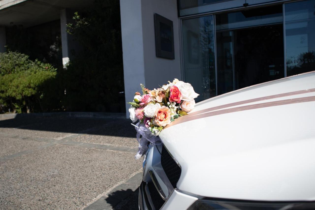 Wyndham Concepcion Pettra Hotel Exterior photo Wedding car