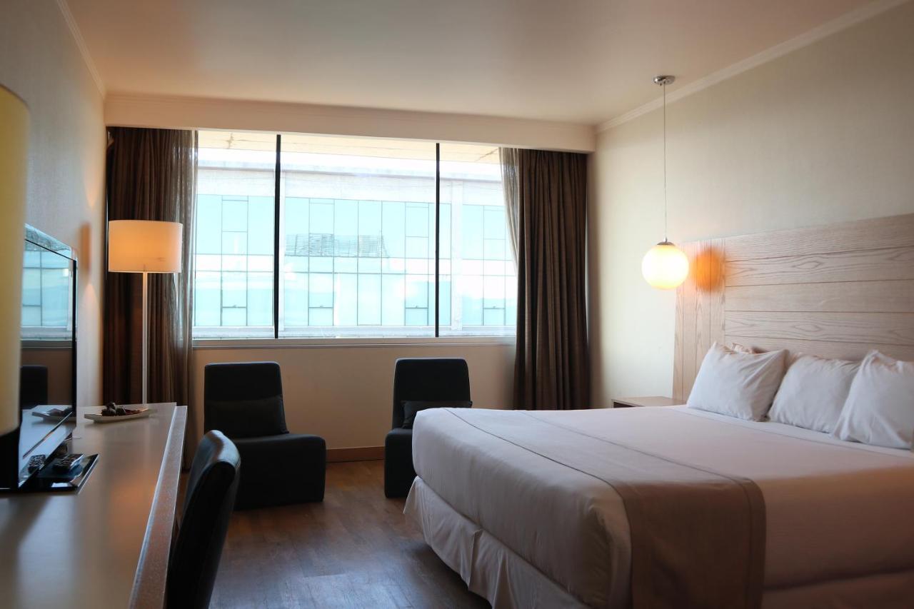Wyndham Concepcion Pettra Hotel Exterior photo A room at the hotel